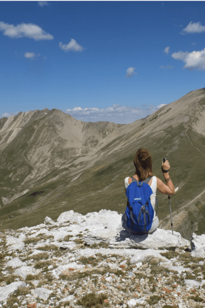 woman climbing mountain